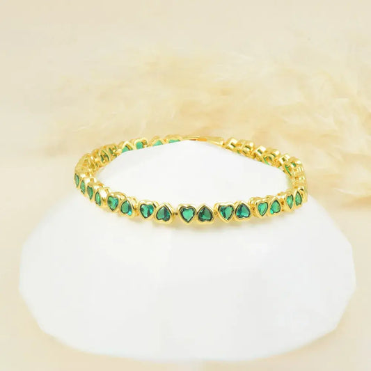 Pulsera de corazones en baño de oro 24k