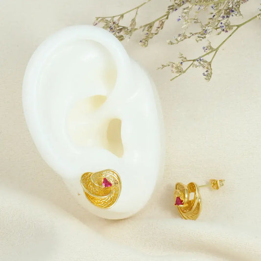 Aretes diseño espiral con piedra roja