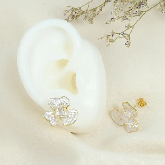 Aretes de topo dorados flor nacarada