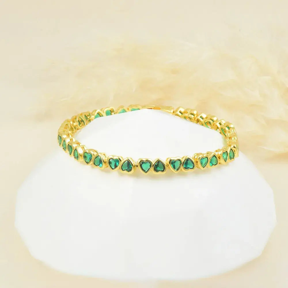 Pulsera de corazones en baño de oro 24k