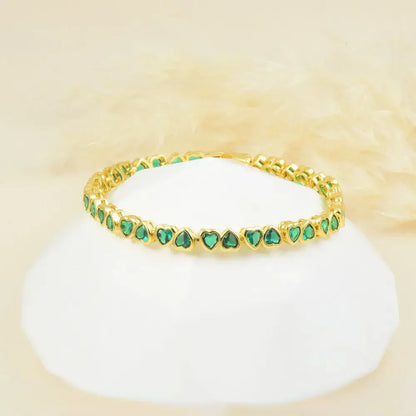 Pulsera de corazones en baño de oro 24k