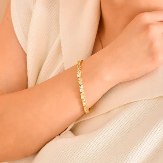 Pulsera de corazones en baño de oro 24k