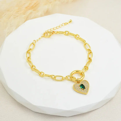 Pulsera dorada cadena con dije corazón