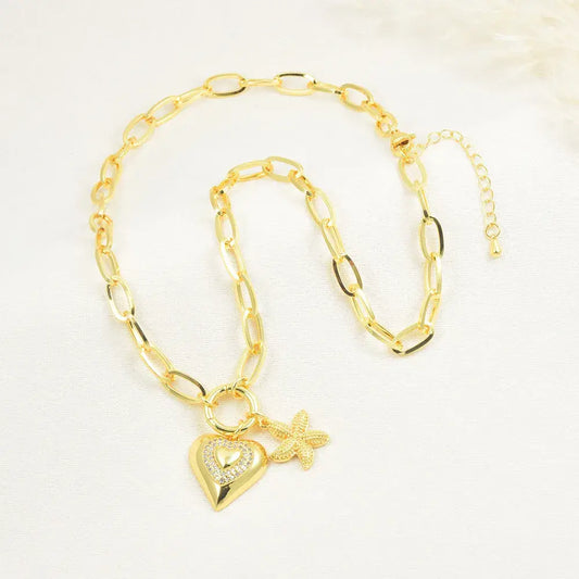 Collar con dijes de corazón y estrella de mar