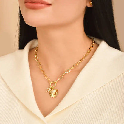 Collar con dijes de Corazón palma y sol
