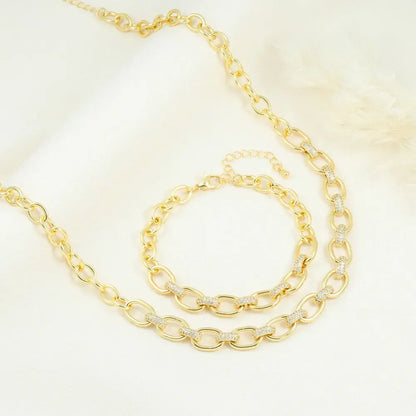 Juego de pulsera y collar con circones incrustados