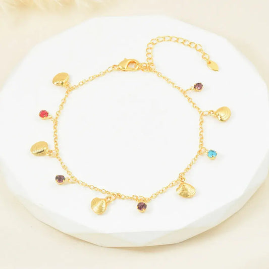 Tobillera con dijes colgantes de mar