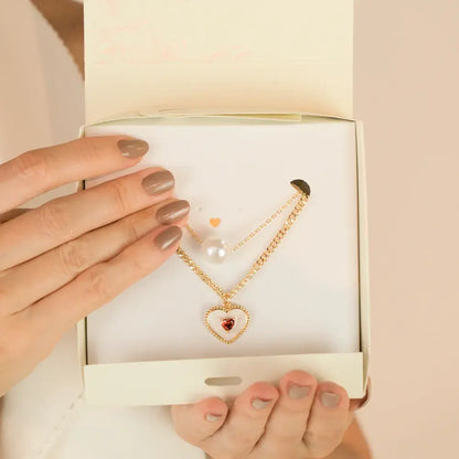 Juego de corazón con perlas