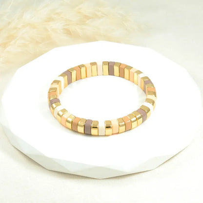 Brazalete dorado tonos neutros
