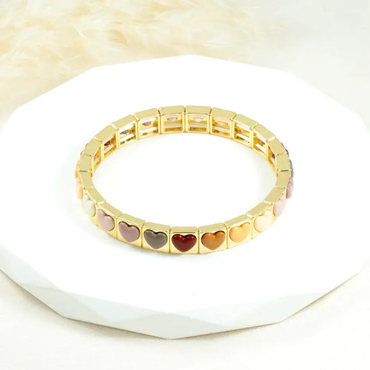 Brazalete dorado corazones minimal