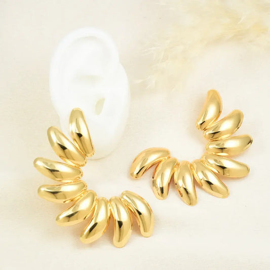 Aretes dorados abanico
