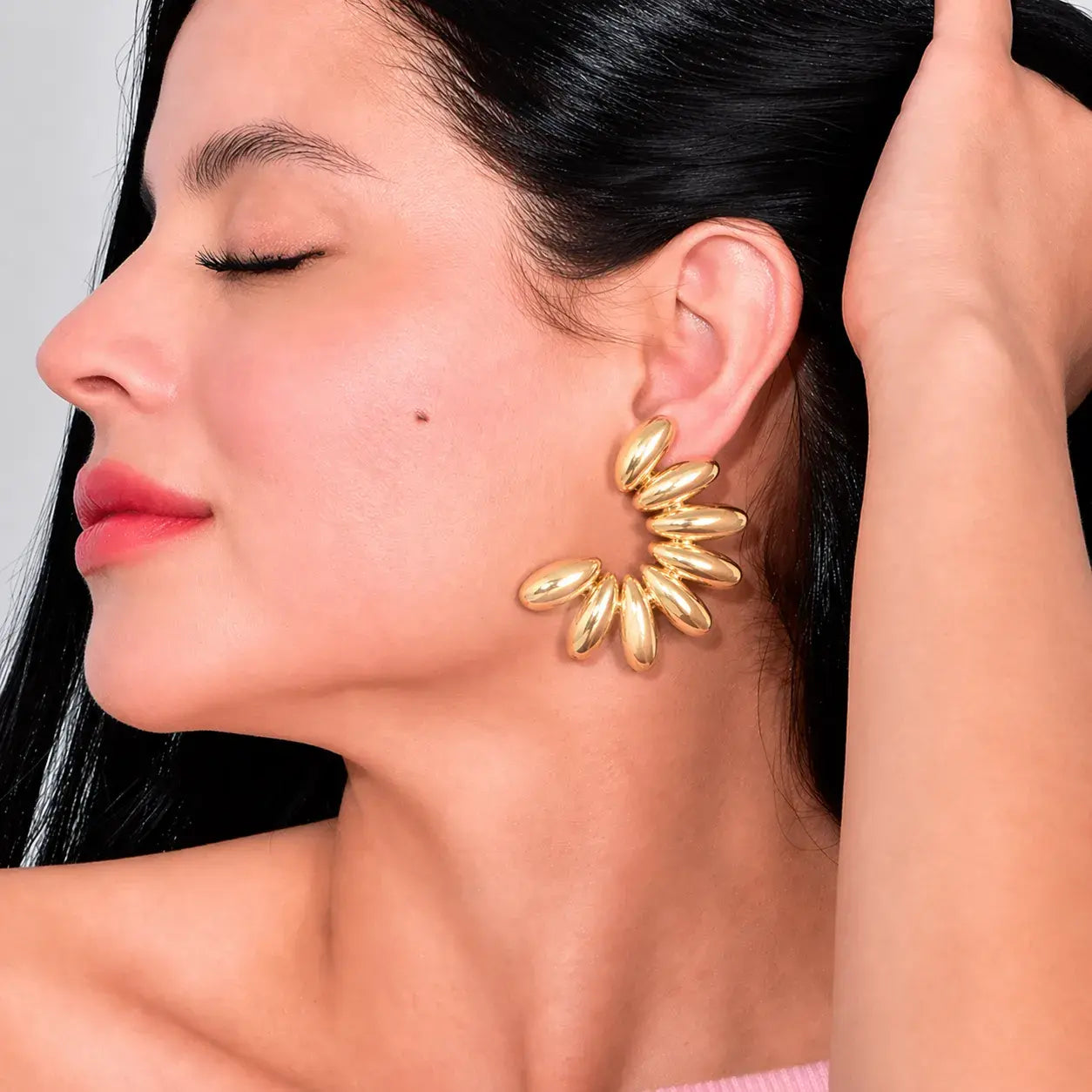 Aretes dorados abanico