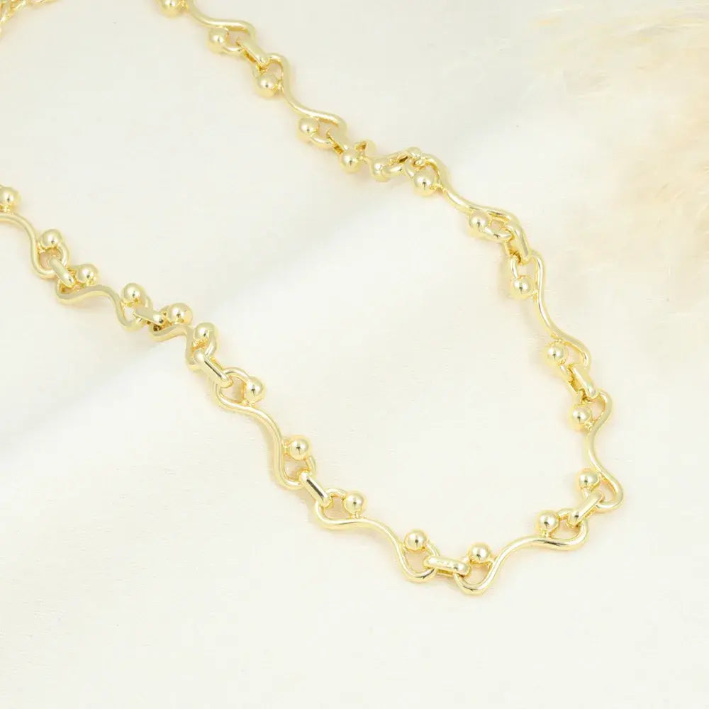 Cadena de eslabones ondulados con balines