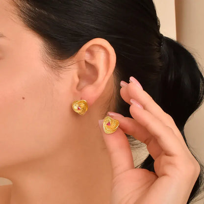 Aretes diseño espiral con piedra roja