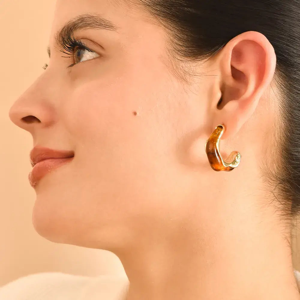 Aretes de topo ondas café