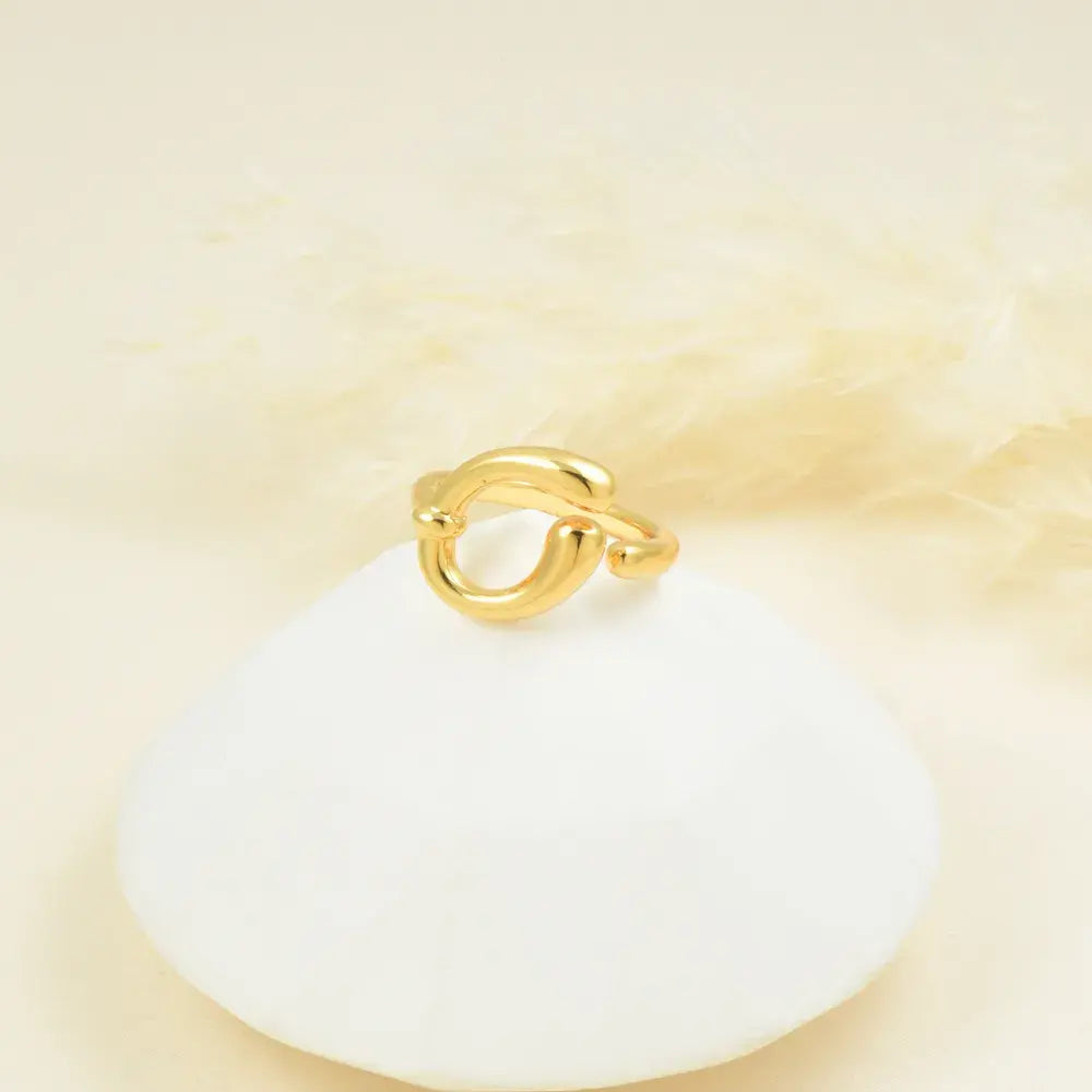Anillo dorado nudo bold