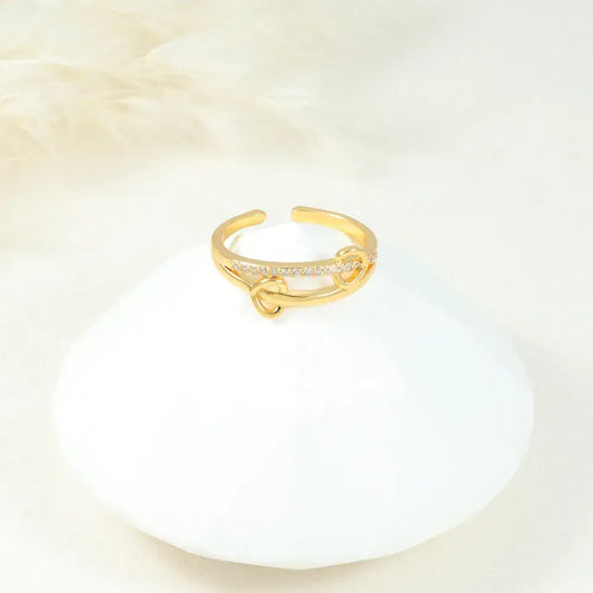 Anillo dorado nudo con brillo