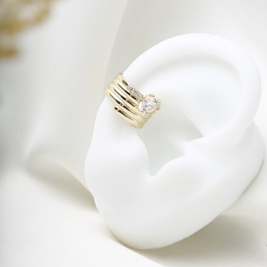 earcuff-dorado-con-diseño-apilado-y-cristal-tipo-lagrima