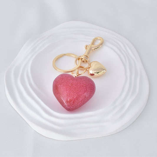 llavero-corazon-fucsia-con-brillo